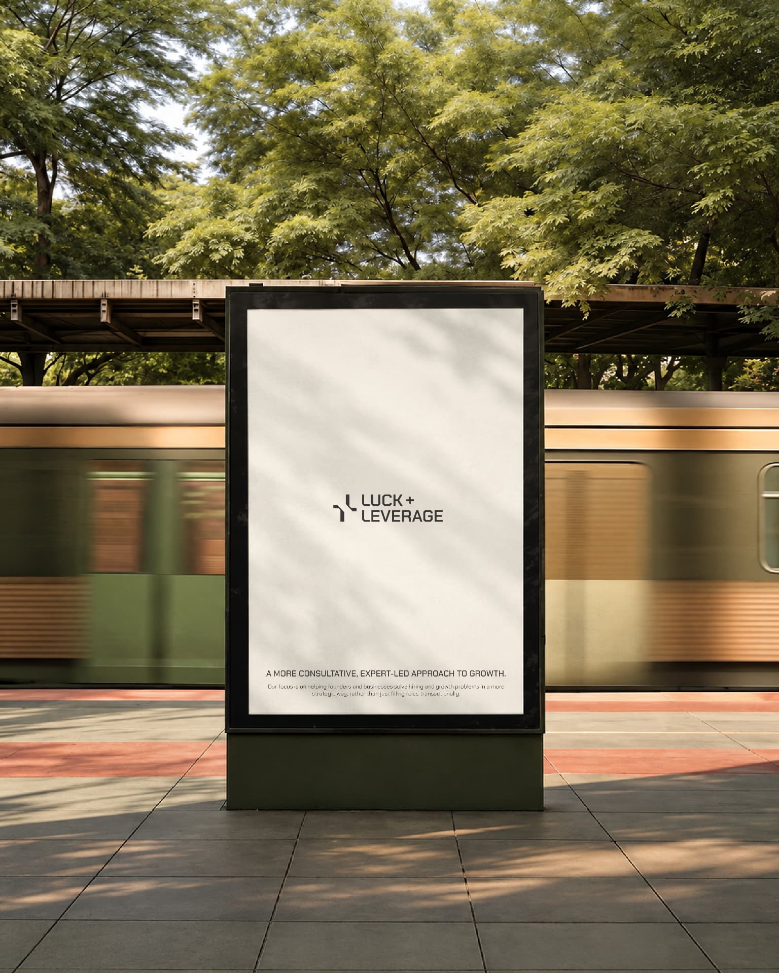 Luck & Leverage platform poster beside a passing train